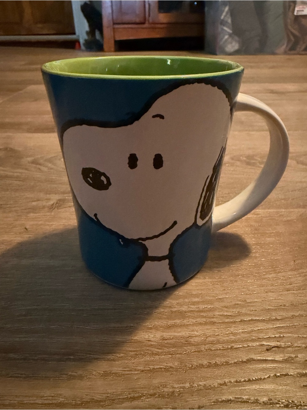Gibson Blue Ceramic Mug with Green Interior Featuring Cartoon Face